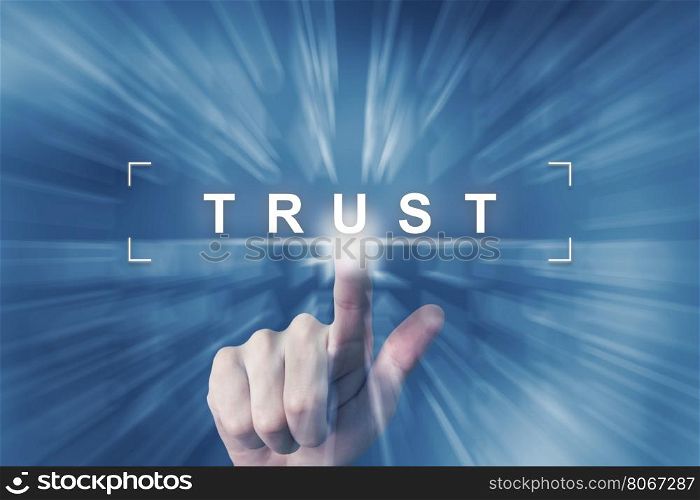 hand clicking on trust button with zoom effect background