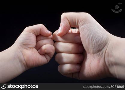 Hand closed for a fist gesture. Hand closed for a fist gesture in black