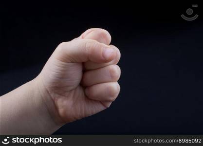 Hand closed for a fist gesture in black
