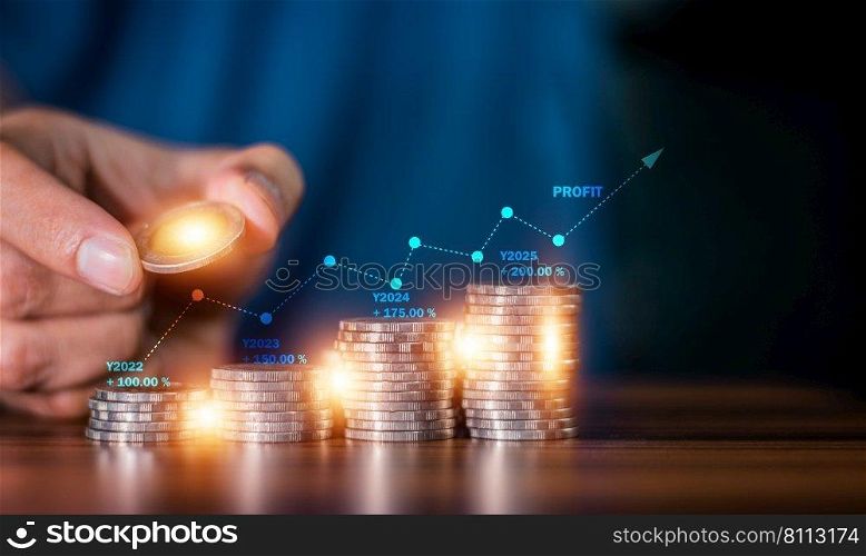 Hand counting coins stack for background business investment investor and stock market concept