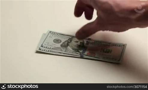 Hand counting dollar bills