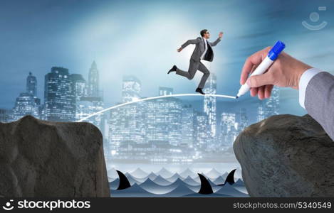 Hand drawing bridge under businessman