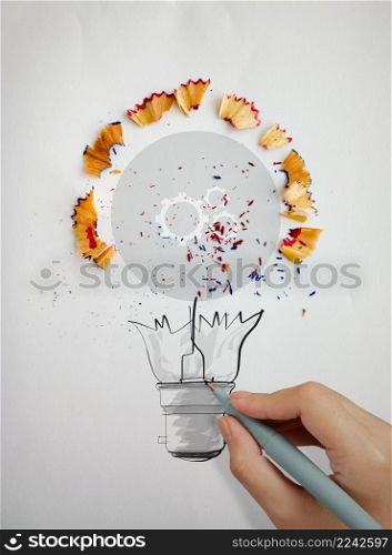 hand drawing light bulb with pencil saw dust and gears icon on paper background as creative concept