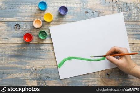 hand drawing white paper with green watercolor brushstroke