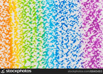 Hand drawn colorful oil pastel rainbow background. Crayon background