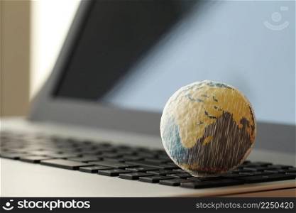 hand drawn texture globe on laptop computer as internet concept
