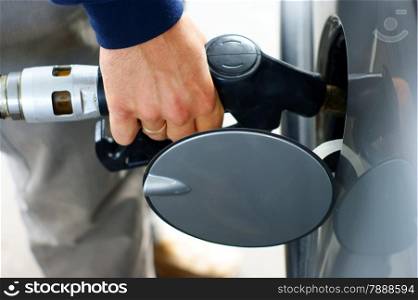 Hand fill up of gasoline