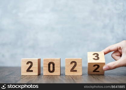 hand flip 2022 to 2023 block. goal, Resolution, strategy, plan,, motivation, reboot, forecast, change, countdown and New Year holiday concepts