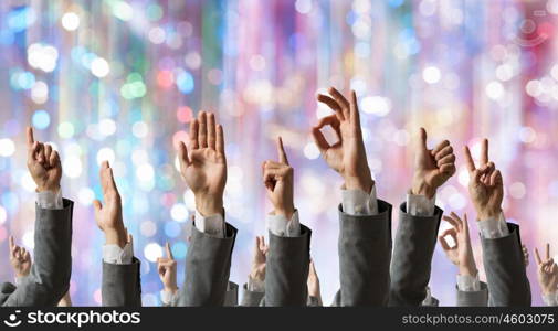 Hand gestures in arow. Group of people with hands up showing gestures