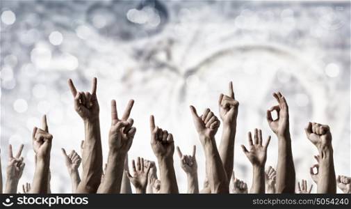 Hand gestures in arow. Group of people with hands up showing gestures
