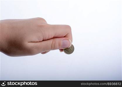 Hand handing money on a white bakground