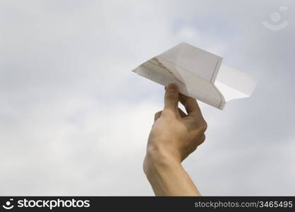 Hand having the paper plane