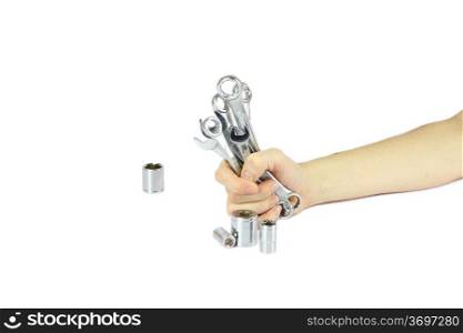 Hand holding a bunch of working tools