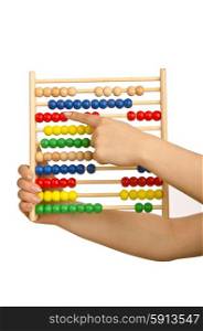 Hand holding abacus on white
