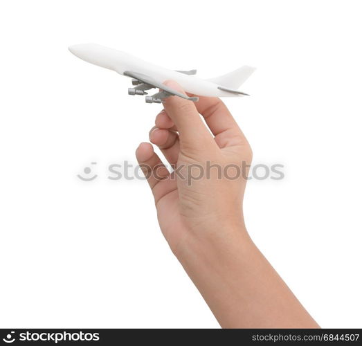 hand holding airplane toy model isolated on white background