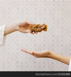 hand holding arab pastry