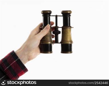 hand holding binoculars