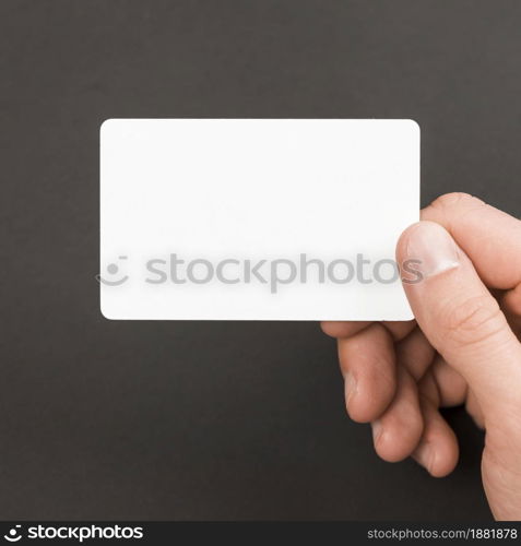 hand holding business card