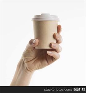 hand holding coffee cup. Beautiful photo. hand holding coffee cup