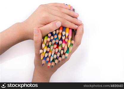 Hand holding Color Pencils on a white background