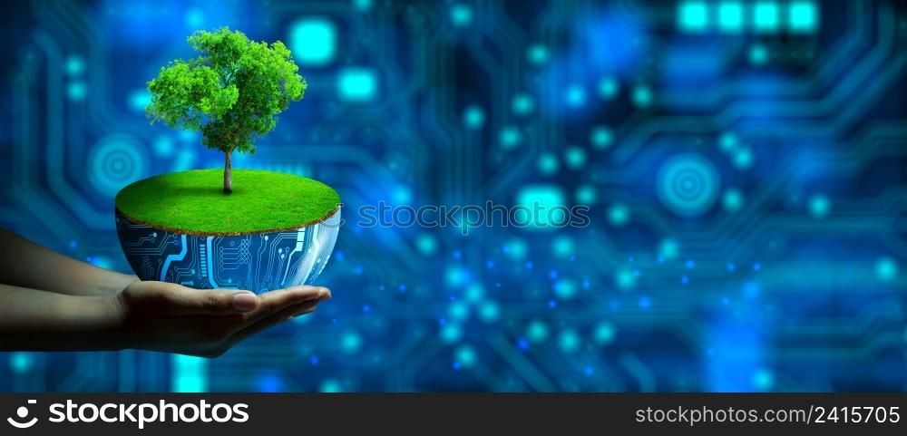 Hand holding digital plant pot with Tree growing on. Eco Technology and Technology Convergence. Green Computing, Green Technology, Green IT, csr, and IT ethics Concept.