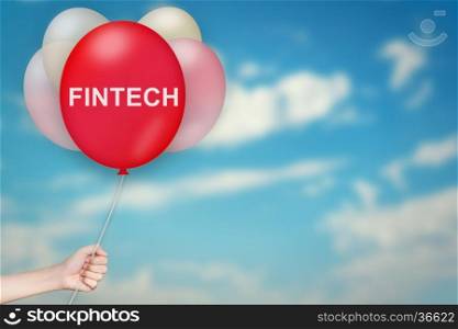 Hand Holding fintech or financial technology Balloon with sky blurred background