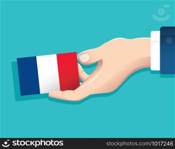 hand holding France flag card with blue background. vector illustration eps10