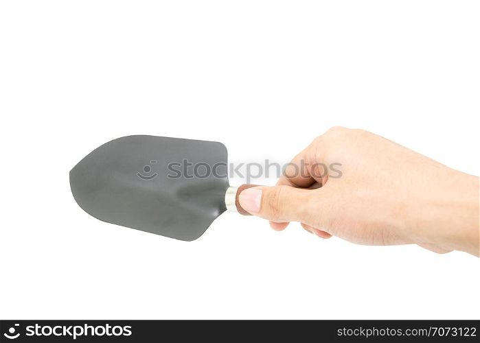 hand holding garden shovel tool isolated on white background.