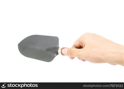 hand holding garden shovel tool isolated on white background.