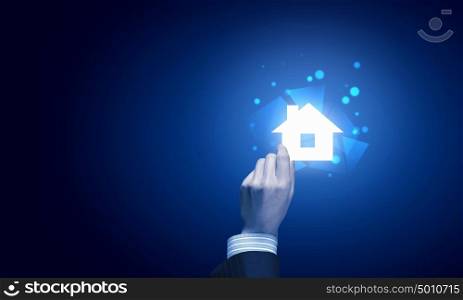 Hand holding house. Vector Illustration.. Close up of hand holding digital icon