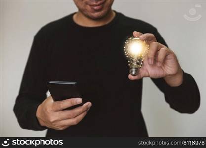 Hand holding light bulb. idea with innovation and inspiration.  innovative technology and solution creative business design concept.