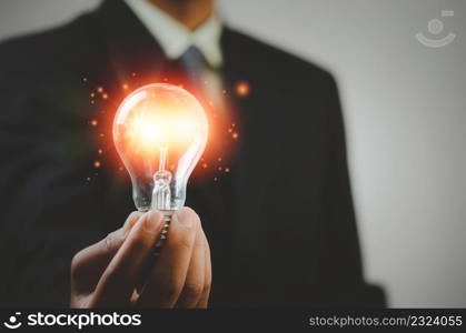 hand holding light bulb ideas Great inspiration and innovation