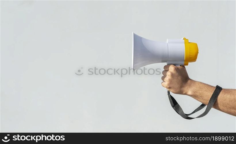 hand holding megaphone protest. Resolution and high quality beautiful photo. hand holding megaphone protest. High quality beautiful photo concept