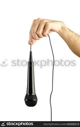 Hand holding microphone on white
