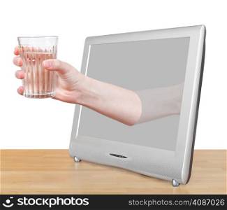 hand holding natural water in glass leans out TV screen isolated on white background