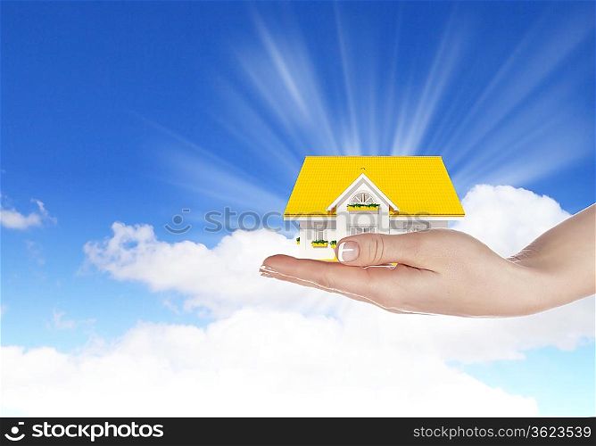 Hand holding / offer house. Real estate concept. Handful collection.