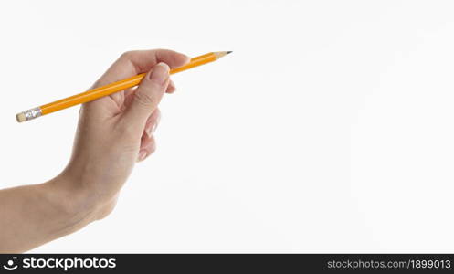 hand holding pencil with copy space. Resolution and high quality beautiful photo. hand holding pencil with copy space. High quality beautiful photo concept