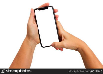 Hand holding phone. Two hands holding and touching new mobile phone isolated on white background