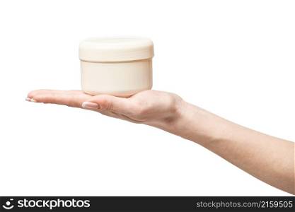 hand holding plastic can of cream Isolated on a white background with clipping path. hand holding plastic can of cream Isolated on a white background