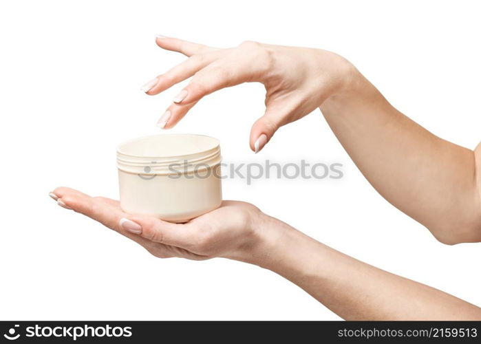 hand holding plastic can of cream Isolated on a white background with clipping path. hand holding plastic can of cream Isolated on a white background