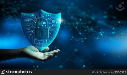 Hand holding Shield with Padlock icon and Network wireframe over blue background abstract. Cyber attack block, Cyber data, and Information privacy Concept. 3D Rendering.
