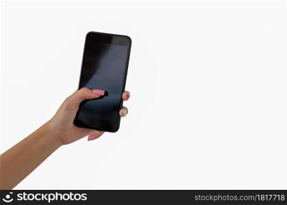 Hand holding smart phone isolated on the white background.