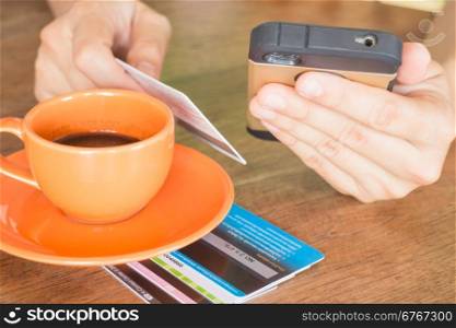 Hand holding smart phone online business, stock photo