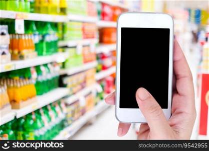 Hand holding smart phone with blank screen on blur supermarket background, mock up, template, business and technology, grocery online, digital marketing concept