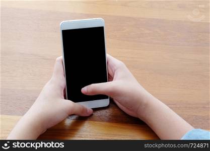 Hand holding smartphone with blank on screen background, mock up, business and technology, digital marketing