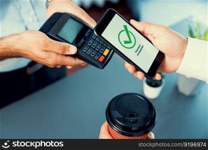 Hand holding smartphone with NFC QR code device, scanning contactless payment code for fast digital transaction. Online banking app on mobile phone for modern lifestyle payment technology. fervent. Hand holding smartphone with NFC QR code device. fervent