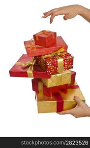 Hand holding stack of giftboxes