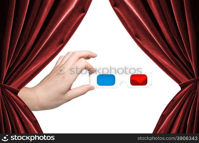 hand holding stereo glasses on white background with curtains