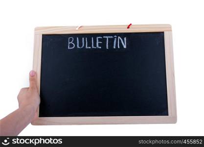 Hand holding the board with the title of bulletin