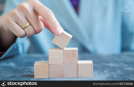 hand holding wooden dice Suitable for making infographics.